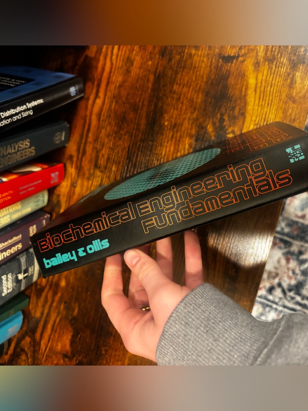 Biochemical Engineering Fundamentals - Black Book with Teal Accent